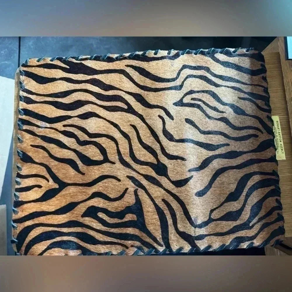Cow hide tiger strip placemat.  A few areas where hair is gone. See photos. - Picture 2 of 7